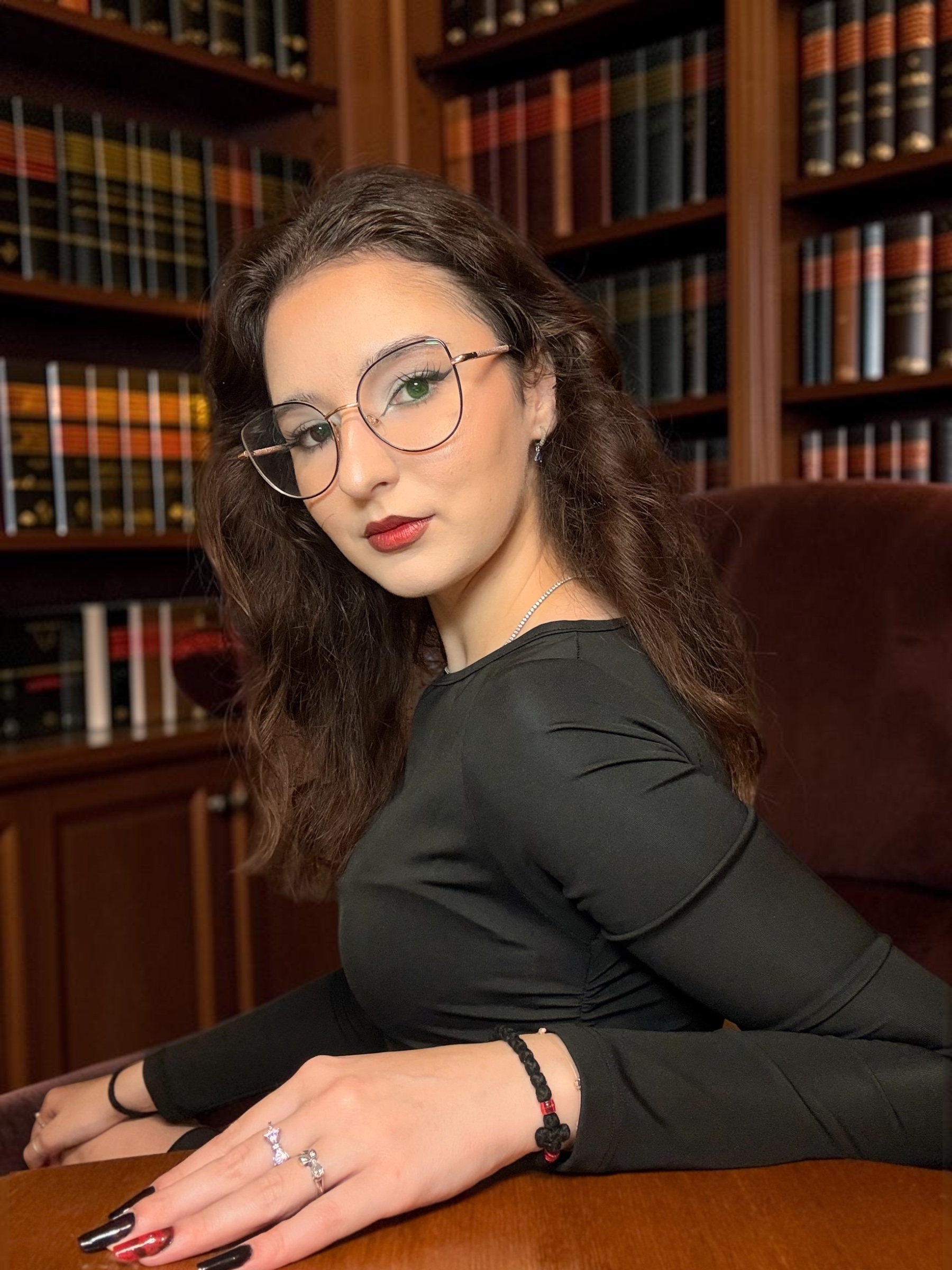 Maria-Teofana seated, looking towards the camera