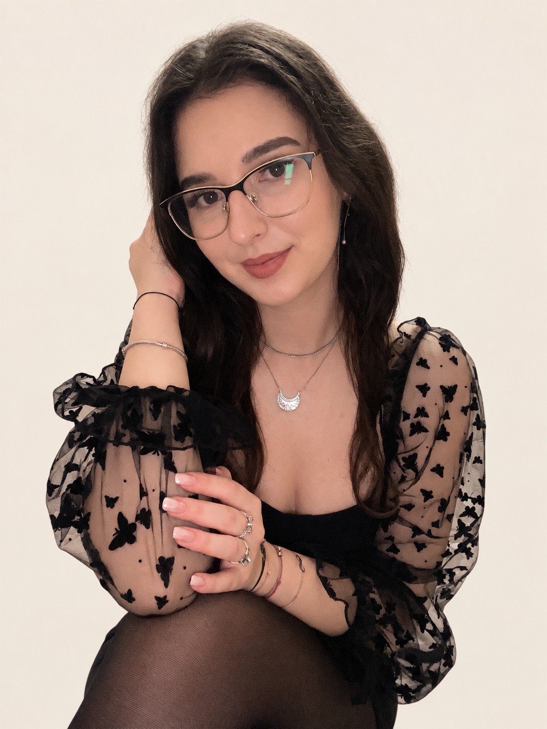 Portrait of Teofana in a butterfly blouse