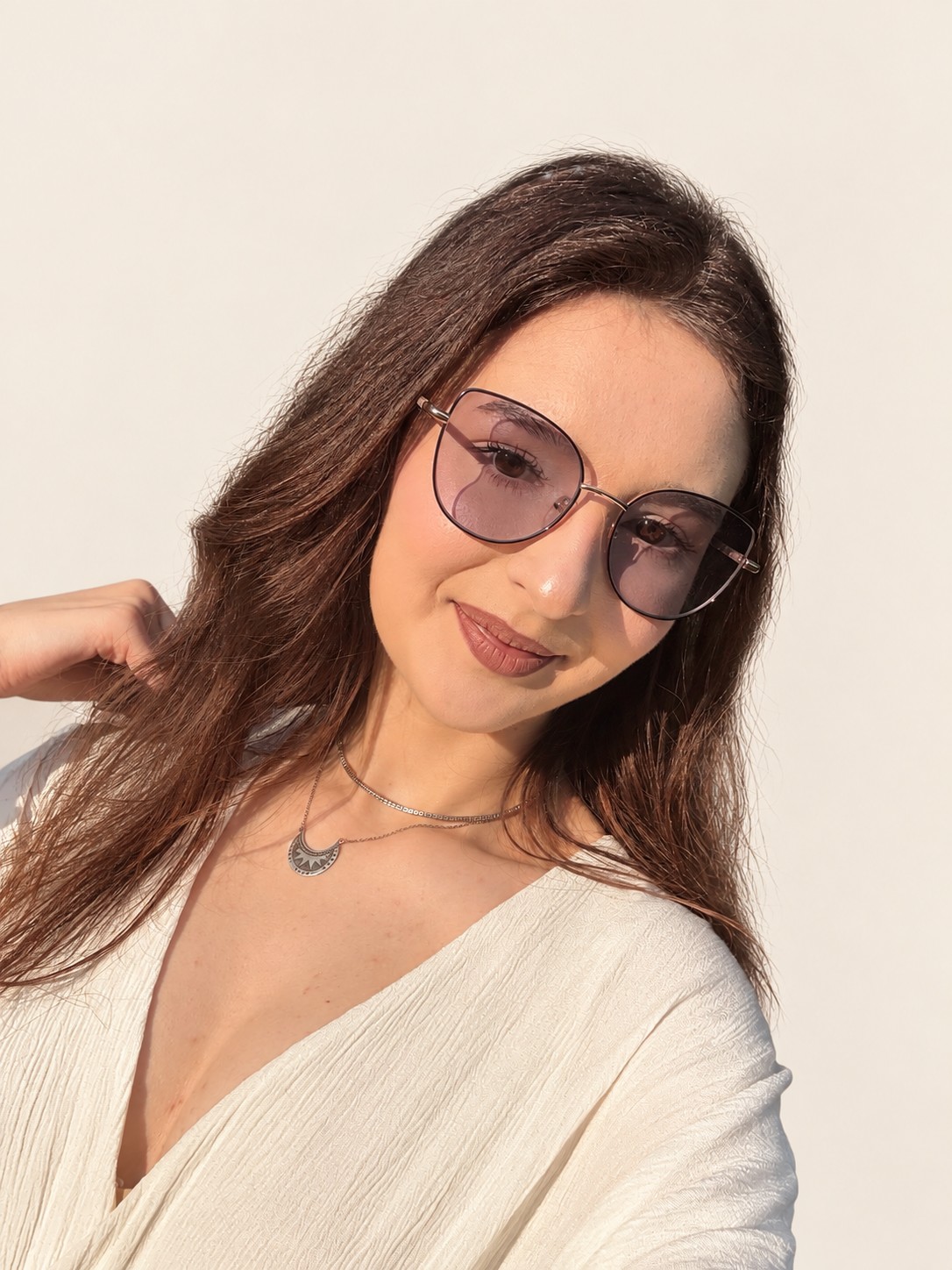 Teofana outdoors wearing glasses